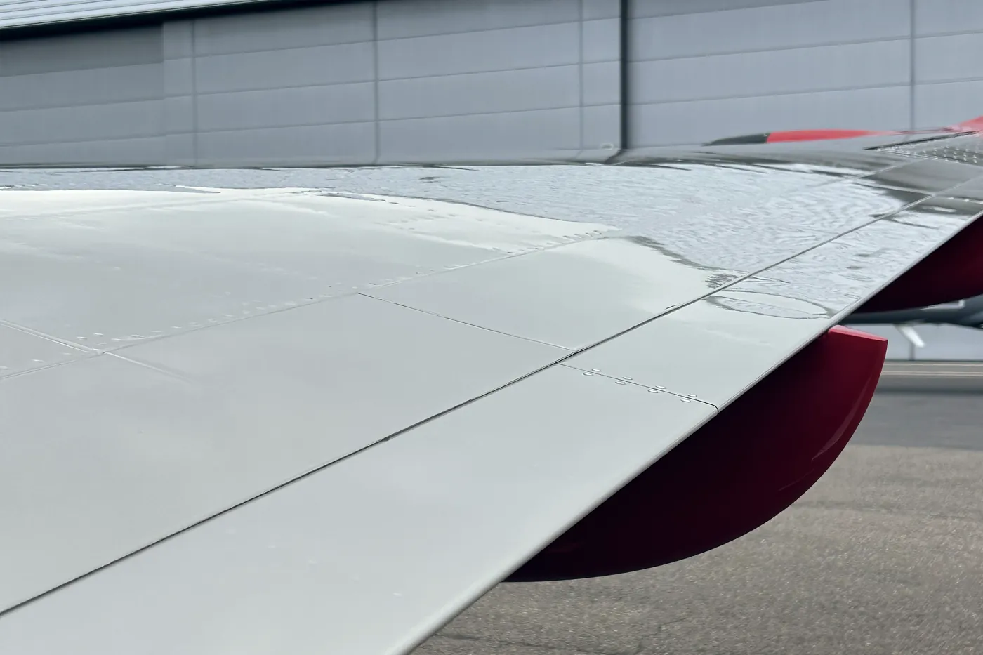 Clean wing leading edge and upper surface after aircraft exterior detailing