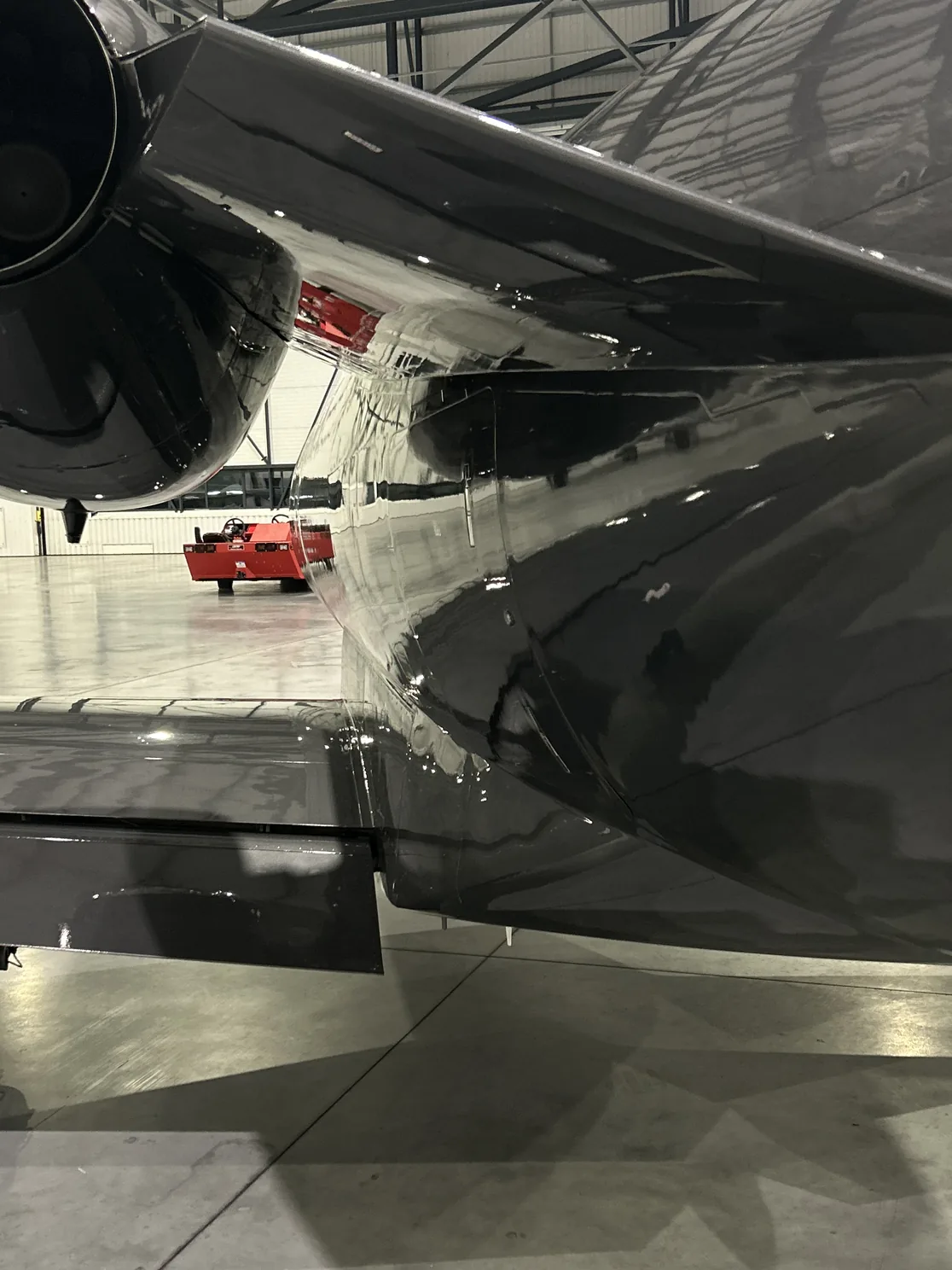 Exterior aircraft cleaning on a light jet in London