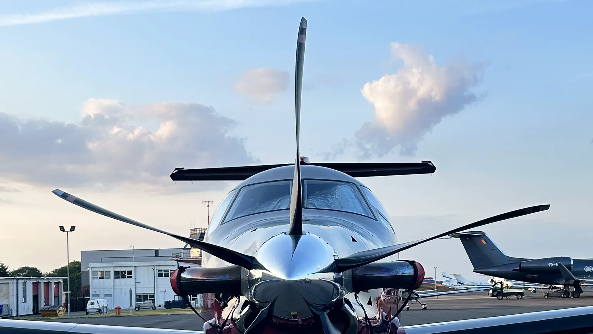 Turboprop aircraft on the ramp at dusk after a full exterior detail by Xperior Aviation