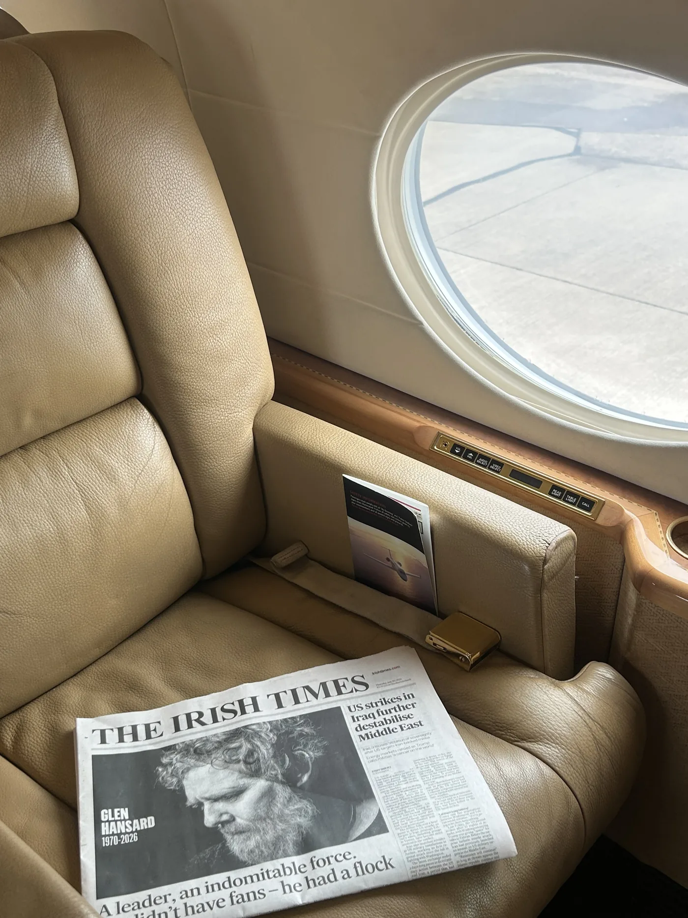 Private jet leather seat and cabin window after interior deep clean